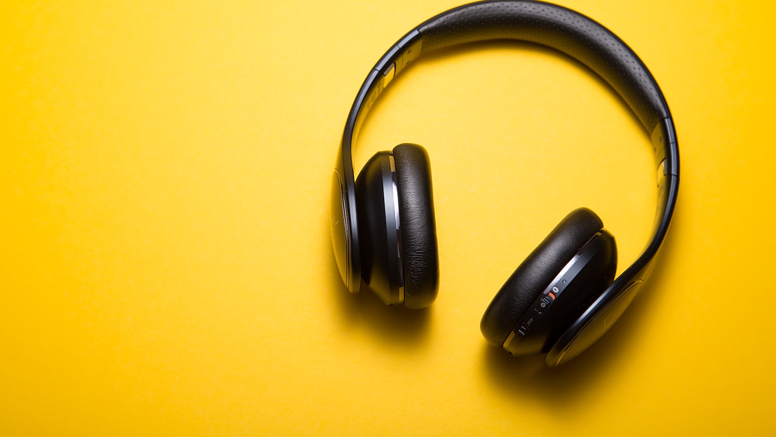 Wireless noise-cancelling headphones on a stand